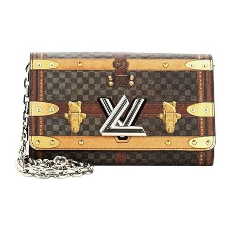 louis vuitton trunk chain wallet|louis vuitton crossbody with chain.